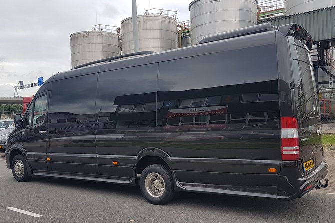 1-15 persons Taxi or Bus Transfer Amsterdam in Amsterdam City - Inside the ride: AC, WiFi, and English-speaking drivers