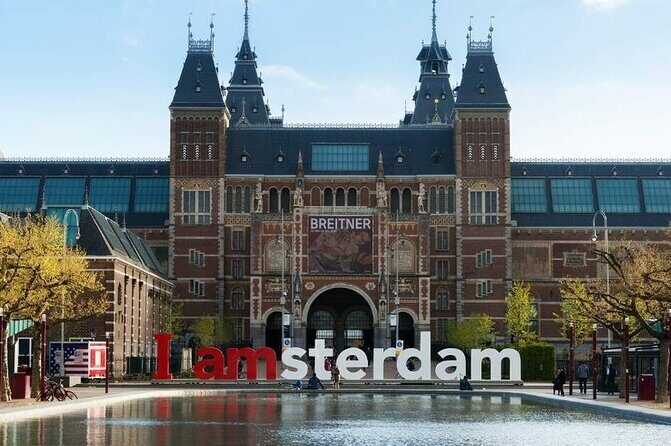 1 Hour Private Amsterdam Rickshaw Tour - Nieuwmarkt and the Waag gateway: historic buildings around a city working square