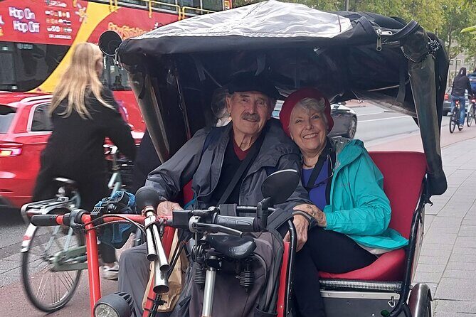 2 Hours Private Amsterdam Rickshaw Tour - Nieuwmarkt and Rembrandtplein: markets, metro convenience, and night energy