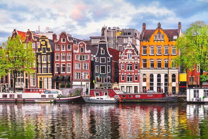 5 hrs Golden Age Amsterdam Private Walking Tour With Local Guide - Centraal Station to the Weeping Tower: medieval walls, churches, and canal-sized surprises