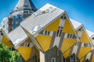 8 hour Walking and Boat Tour to Rotterdam and Kinderdijk - Sint-Laurenskerk, Erasmus sculpture, and the reason Rotterdam survived