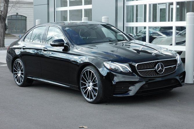 Airport or Port transfer Business Class (private car service) - Pickup that adapts when flights and ships slip