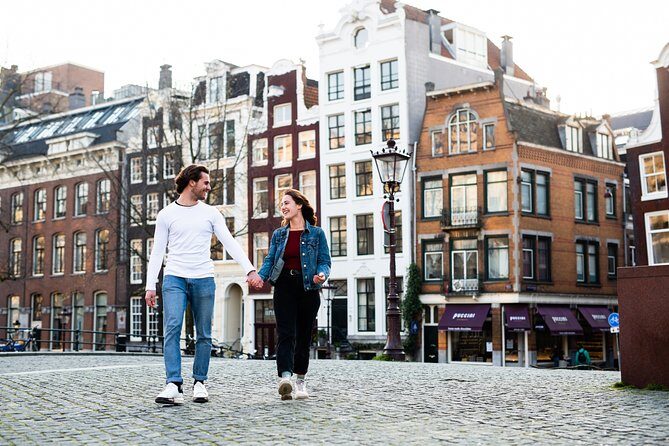 Amstagram Tour & Moco Experience - The Amstel River Moment: Don’t Miss The Drunken Houses Shot