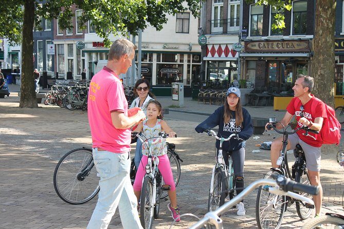 Amsterdam 3 hrs Bike Tour – live guide En/Fr/De/Nl/Sp - IJ River Views at Muziekgebouw aan ’t IJ: Where the Tour Changes Mood