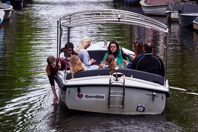 Amsterdam 90-min Private Canal Cruise with Live Guide and Drinks - Herengracht and the Golden Bend’s merchant-house drama