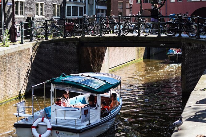 Amsterdam 90-min Private Canal Cruise with Live Guide and Drinks - Dancing Houses, Monet’s canal, and the fun side of Amsterdam