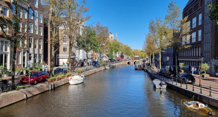 Amsterdam All In One Tour Walking Tour - Dam Square and the Royal Palace: the city’s power center