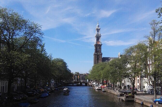 Amsterdam and Countryside Private Full-Day Tour by luxury car - Dam Square and Amsterdam’s origin story