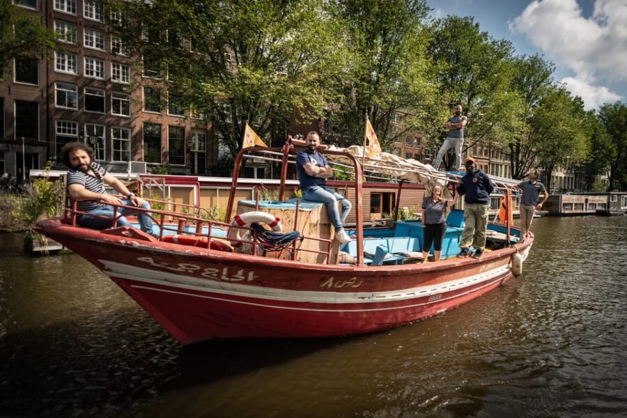 Amsterdam: Canal Cruise on a Wooden Refugee Boat - The Lampedusa concept: more than a shipping company