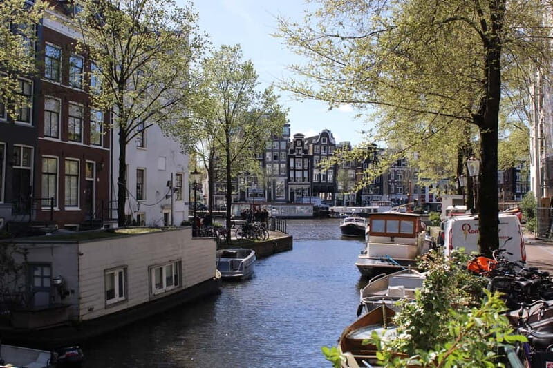 Amsterdam: City walking experience with a local - Nieuwmarkt Square and Amsterdam Centraal: WWII impact and the bike question