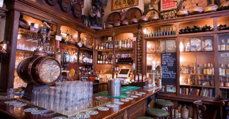 Amsterdam: Exclusive Red Light District Tour and Drink - Royal Palace, Grachtengordel Canals, and the City’s Big Squares