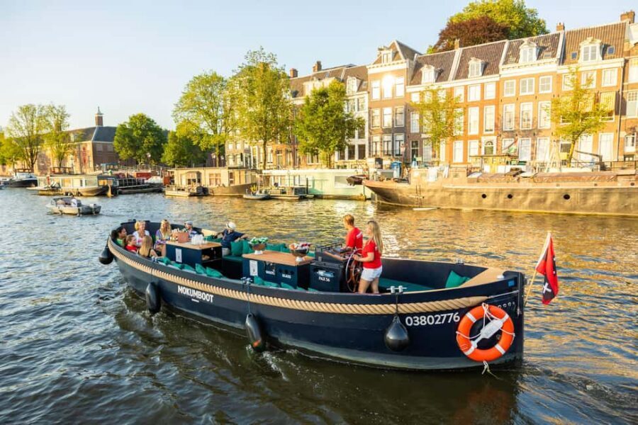 Amsterdam: Guided Open Boat Canal Cruise Including Drink - Who this Amsterdam open-boat cruise suits best