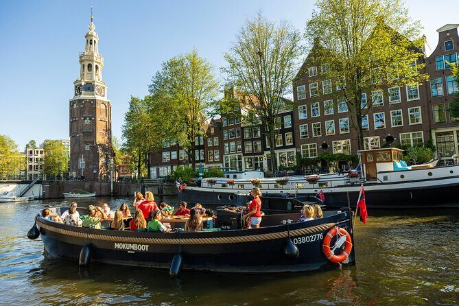Amsterdam: Guided Open Boat Canal Cruise Unlimited Drinks Option - Starting at Stationsplein: how to set yourself up for the best hour