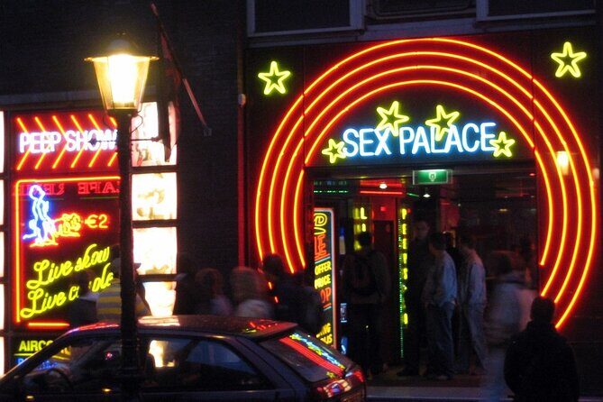 Amsterdam: Guided Red Light District and City Walking Tour - The Smallest House: VOC Storage to Long-Time Living