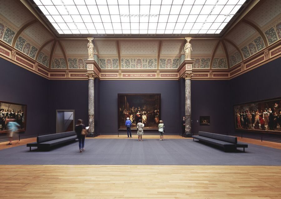 Amsterdam: Guided Rijksmuseum Tour in Spanish - Van Gogh Museum building and Volendam houses in a short window