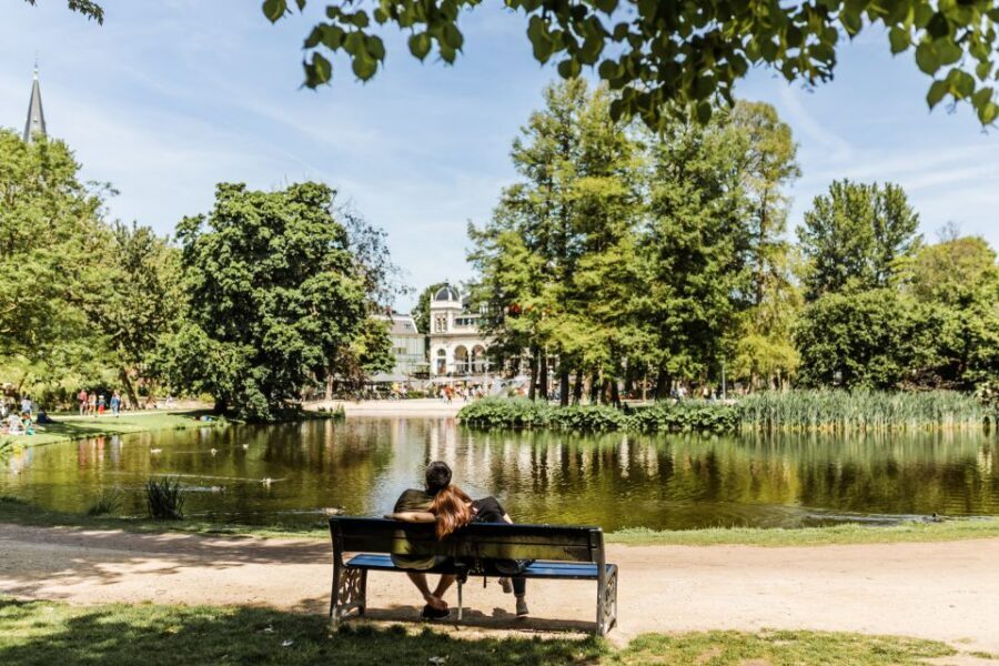 Amsterdam: Highlights & Hidden Gems Private Walking Tour - Bloemenmarkt on the canals: flowers, history, and a great pause point