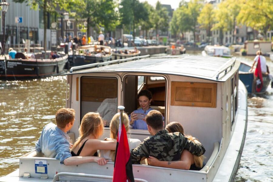 Amsterdam: Historic Boat Cruise with open bar and nibbles - Meeting on Singel: Find Hotel Canalview and Look for the Dock