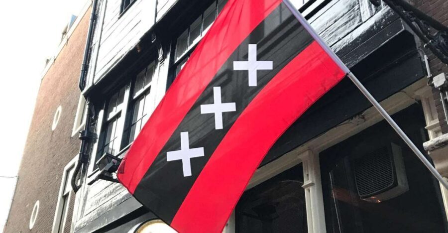 Amsterdam: Introduction walking tour - Old Town stops: Old Church, Waag, Chinatown, Rembrandtplein, and the smallest house