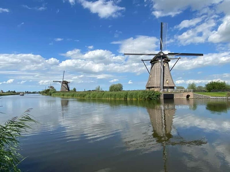 Amsterdam: Kinderdijk, Euromast, Delft and Den Haag Day Tour - A small-group route that strings Holland together
