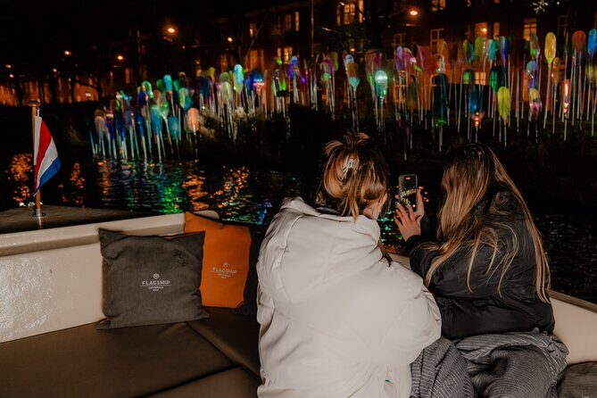Amsterdam Light Festival: Canal Cruise + Bite & Unlimited Drinks - Entering Amsterdam’s Light Festival from the Canal Side