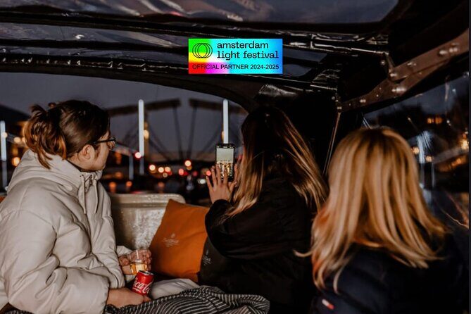 Amsterdam Light Festival: Cruise Unlimited Drinks & Bite option - What the boat is like: comfort, windows, and that canal wind