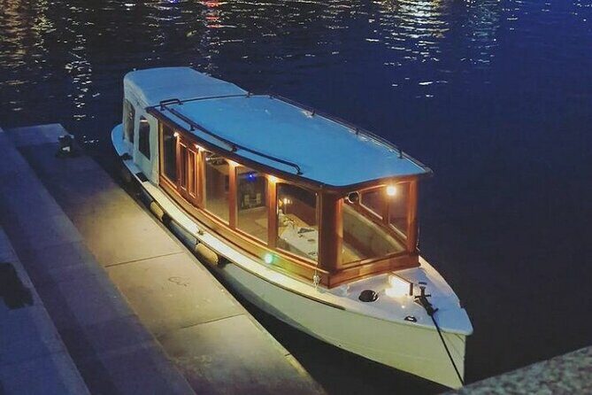 Amsterdam Light Festival Private Cruise With Welcome Drink - Amstel River: The Wide Waterway for Bigger Light Sculptures