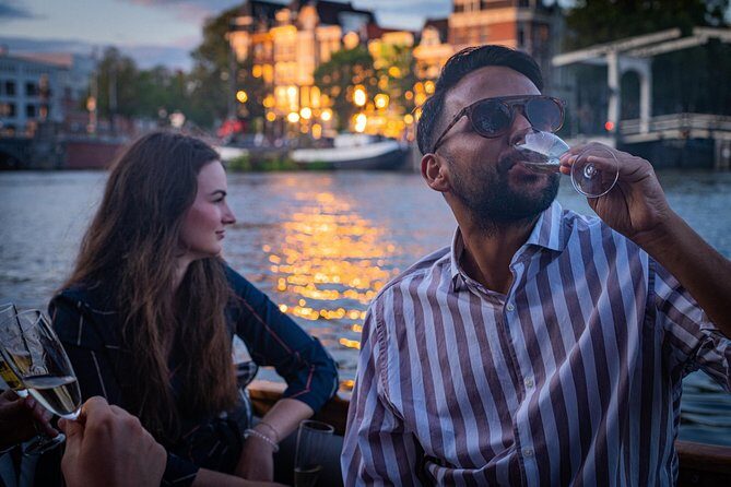 Amsterdam Light Festival Private Cruise With Welcome Drink - Maritime Museum Stop and the Trading Ship Replica Look