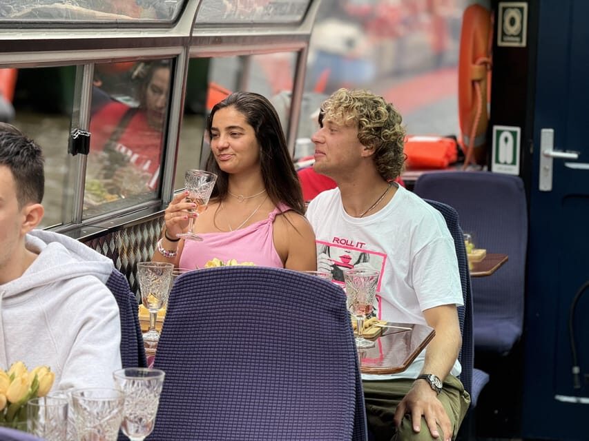 Amsterdam: Luxury Cheese & Wine Canal Cruise - The boat ride: Amsterdam landmarks, historic architecture, and real-world comfort