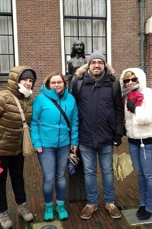 Amsterdam: Must-See Attractions Guided Walking Tour - Portuguese Synagogue and Nieuwmarkt Square: layers you can still feel