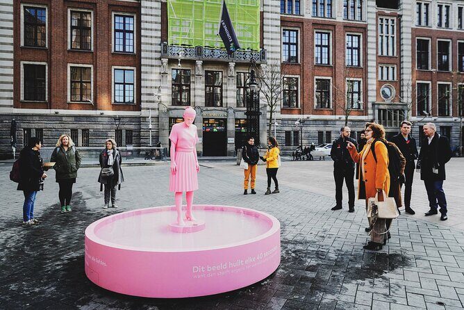 Amsterdam Must-See Historical City Walk with Local Expert - Stop-by-stop: what you’ll notice at each landmark