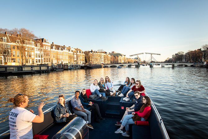 Amsterdam Open Boat Cruise in Old City Center with Live Guide - What You’ll See Along the Ride (and What to Expect From an Hour)