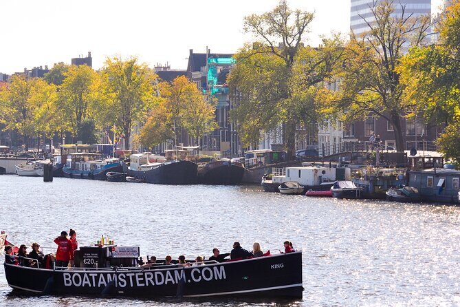 Amsterdam Open Boat Cruise in Old City Centre with Drinks Options - Boarding at Amstel 51F and the Hermitage-side departure