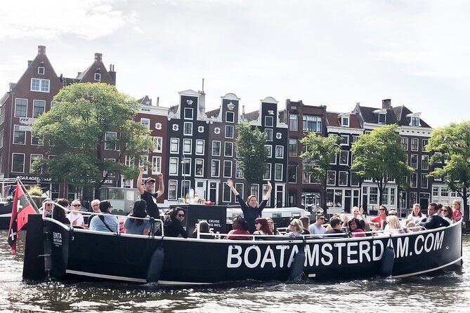 Amsterdam Open Boat Cruise in Old City Centre with Drinks Options - The 1-hour canal route: what you’ll see and why it’s worth it