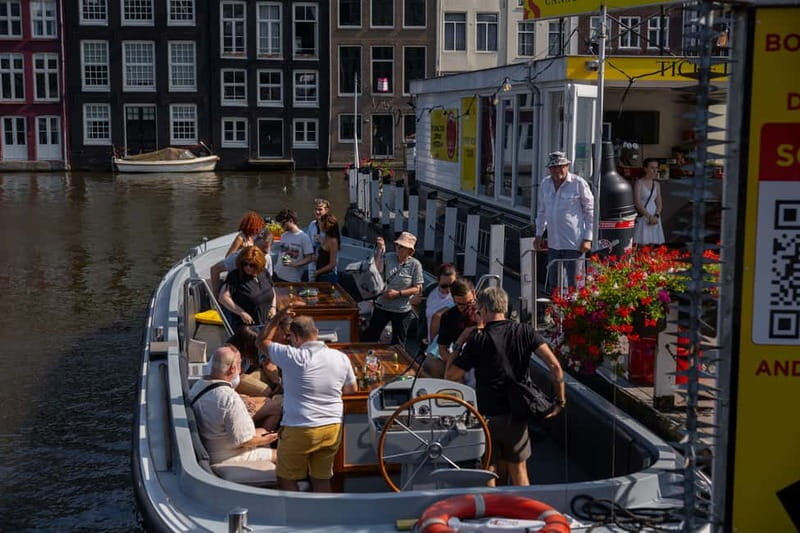 Amsterdam: Open Boat Tour of Canals with Expert Local Guide - Key highlights at a glance