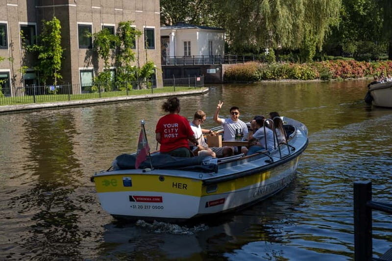 Amsterdam: Open Boat Tour of Canals with Expert Local Guide - Value check: is $26 worth it for 1 hour of canals?