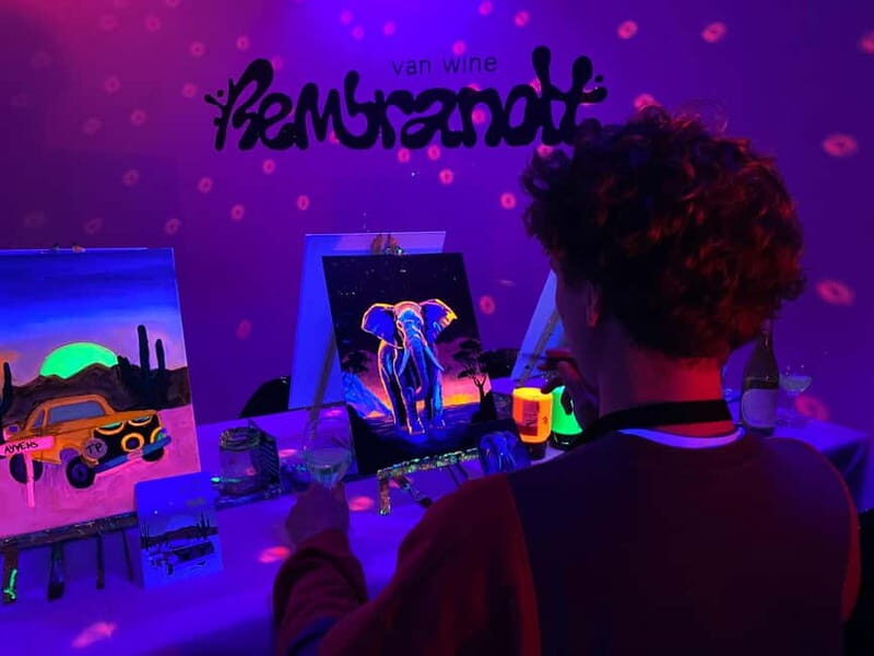 Amsterdam: Paint and Sip in the Dark at Rembrandt van Wine - The neon-in-the-dark setup: what it’s like in Amsterdam
