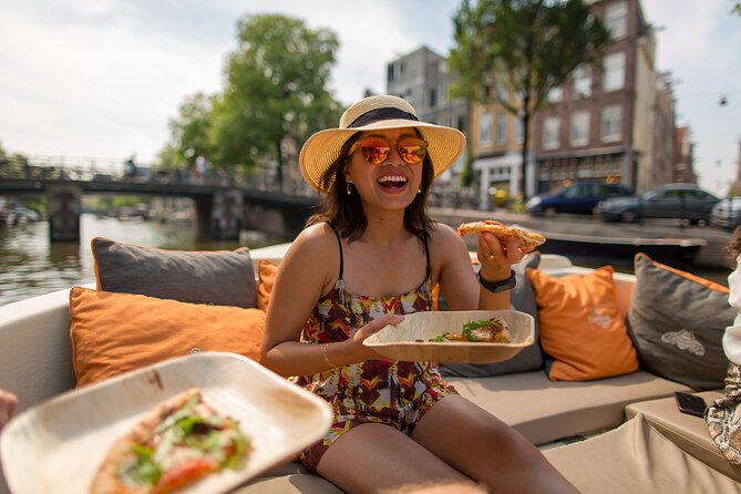 Amsterdam Private Boat Trip with Pizza and Unlimited Drinks - Private boat, real comfort, and food that doesn’t feel like an afterthought