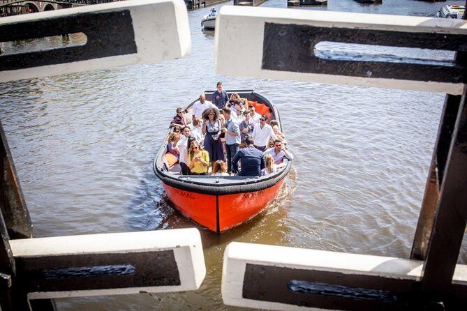 Amsterdam Private Boat Trip With Skipper, Burger and Beers - Canal belt moments: Oude Kerk, main canals, Jordaan, and houseboats