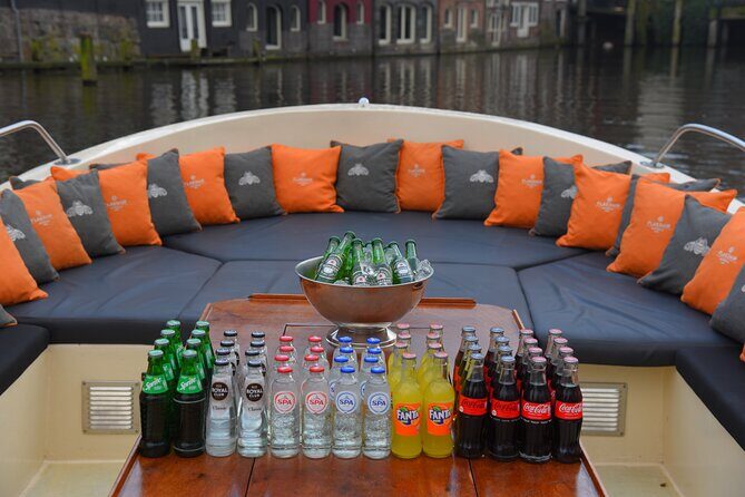 Amsterdam Private Boat Trip With Skipper, Burger and Beers - The first canal stretch: Rijksmuseum, Anne Frank, and the canal-level wow factor