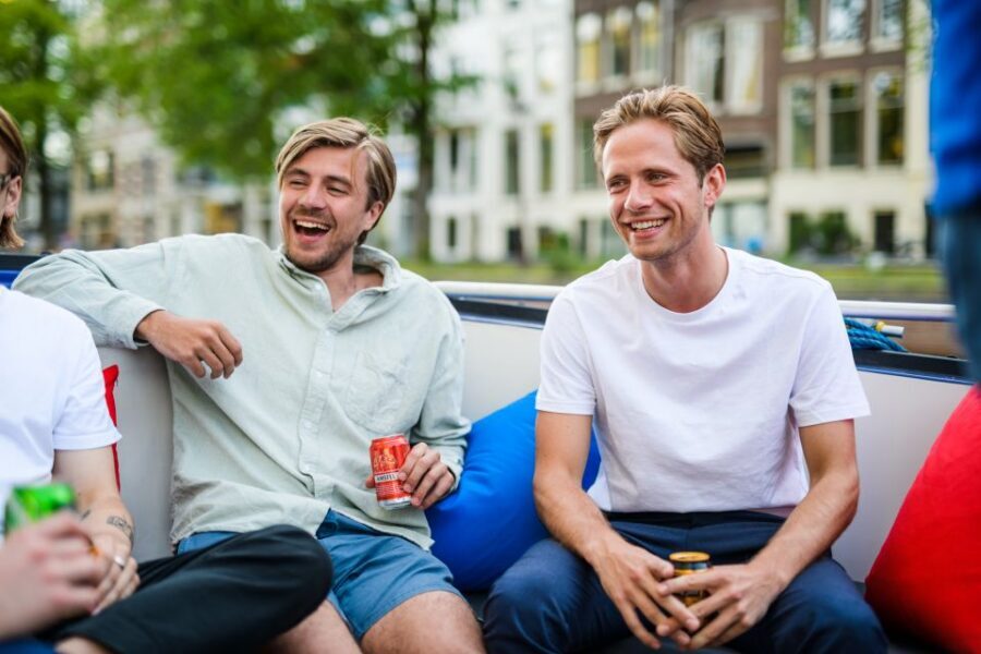 Amsterdam: Private Canal Booze Cruise with Unlimited Drinks - Getting On Board at Amstel 178 Without the Stress
