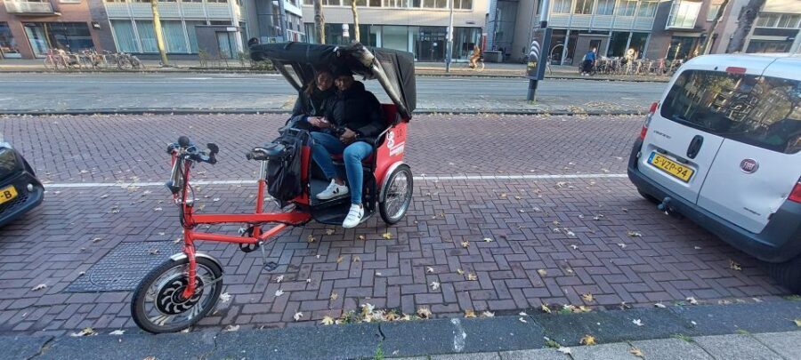 Amsterdam: Private City Highlights Tour by Rickshaw - Getting Oriented in Amsterdam-Centrum: Hotel Pickup to Dam Square