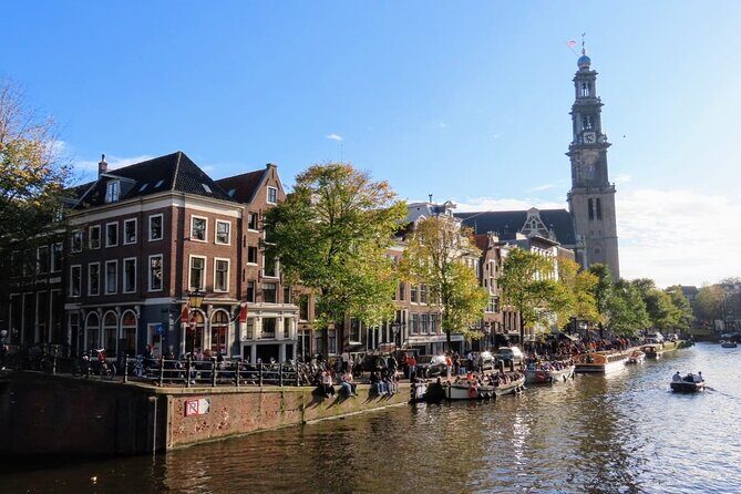 Amsterdam private city walking experience with a local - House on the Three Canals: canals, design, and the bicycle bridge idea
