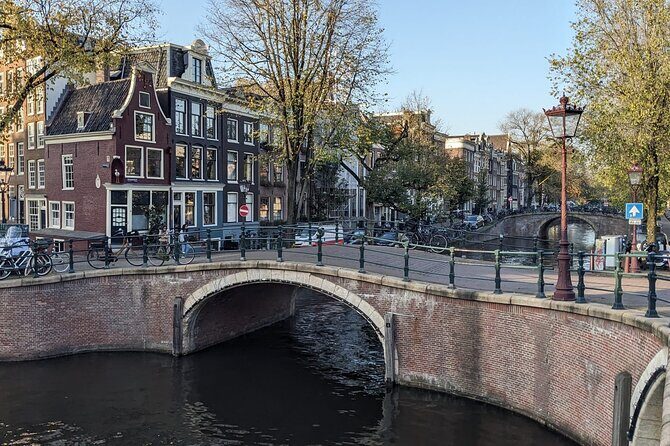 Amsterdam private city walking experience with a local - Nieuwmarkt: the Waag, guilds, and the story behind the dancing houses