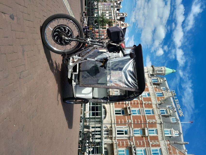 Amsterdam: Private Guided City Tour by Pedicab - Munttoren and the Flower Market: views with a practical payoff