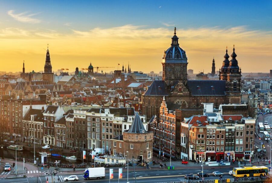 Amsterdam: Private Guided Walking Tour - Canal Belt walk: bridges, houseboats, and the canal-ring feeling