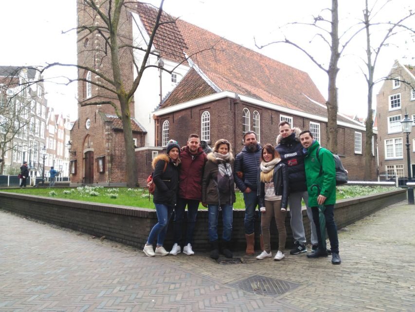 Amsterdam: Private Guided Walking Tour - Landmark pauses: Begijnhof, Flower Market, Anne Frank House area, and Rembrandt Museum