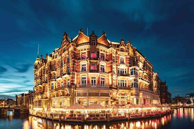 Amsterdam: Private Romantic Evening Canal Cruise + Bubbles/Snacks - Seven Bridges lit up at once: the skyline moment you’ll remember