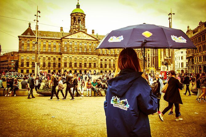 Amsterdam Private Walking Tour - Dam Square: Amsterdam’s centerpiece with royal and national landmarks