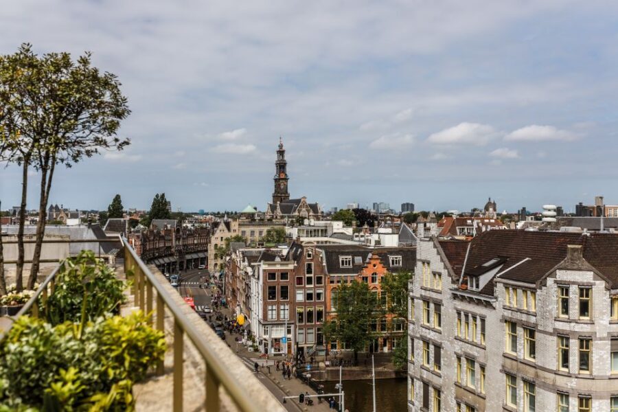 Amsterdam: Private Walking Tour of Jordaan & De 9 Straatjes - Galerie Geluk and Asian antiques: a stop that adds surprise