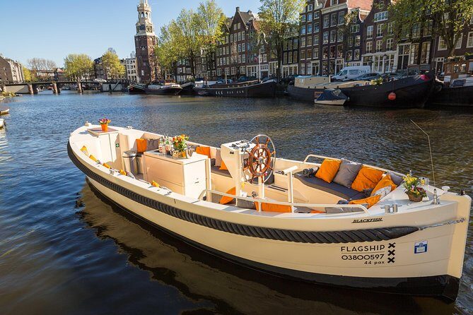 Amsterdam: Saloon Boat Cruise + Unlimited Drinks & Bite option - Weather on the water: open-air means you need layers